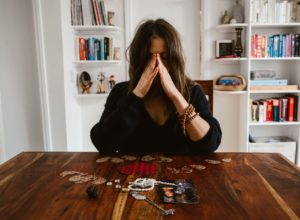 woman with hands on table